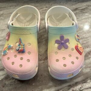 Pink ombré crocs with charms